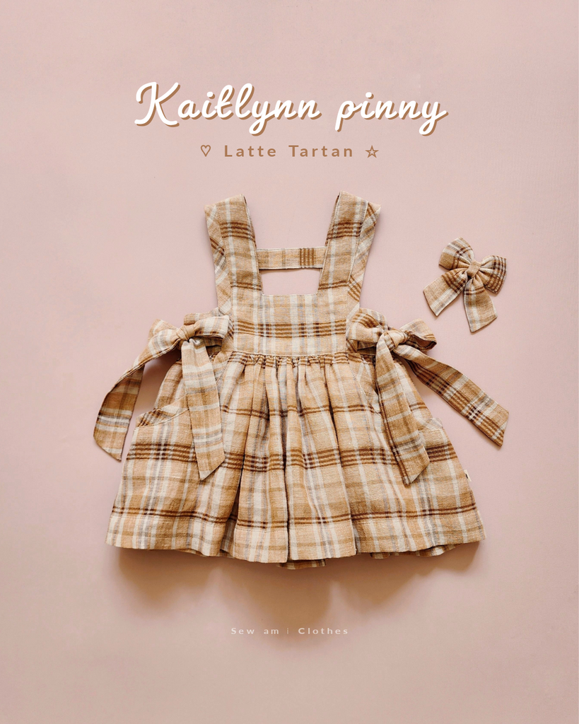 • Kaitlynn Pinny • Latte Tartan & Tail bow